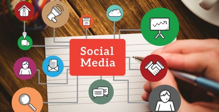 digital composite of hands using notebook with graphics